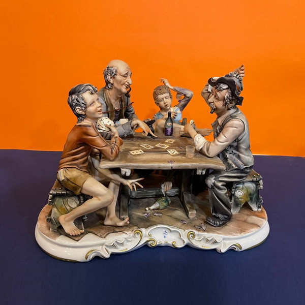 Porcelain Sculpture Representing Friends Playing Cards Sitting in a Table