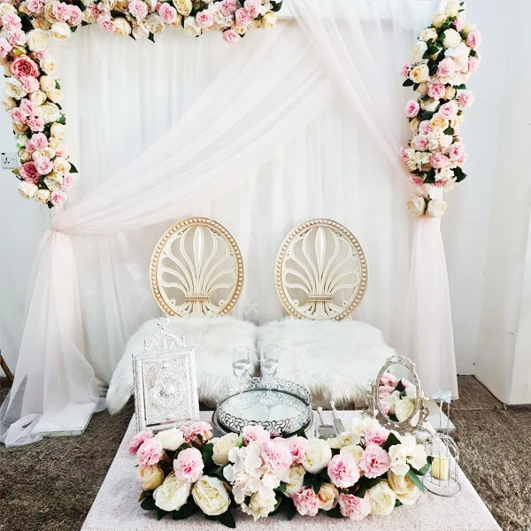 White & Pink Shade Wedding Decoration with Big Table, 2 Elegant Chairs, Gate Square Metallic Stand Decorated with Flowers & Sheet, Silver Metallic Quran Book, etc..