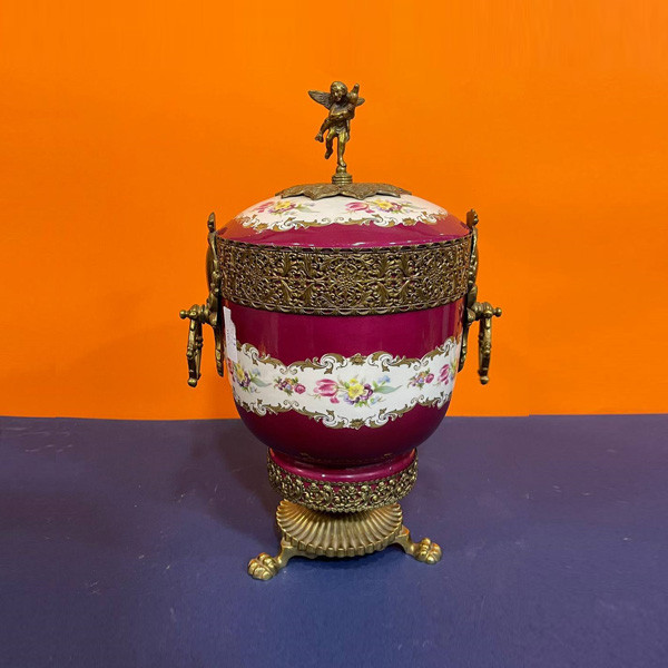 Collectible Vase with Bronze Decoration, Coral Colored with White Lines Painted with Flowers & a Bronze Angel at its Top