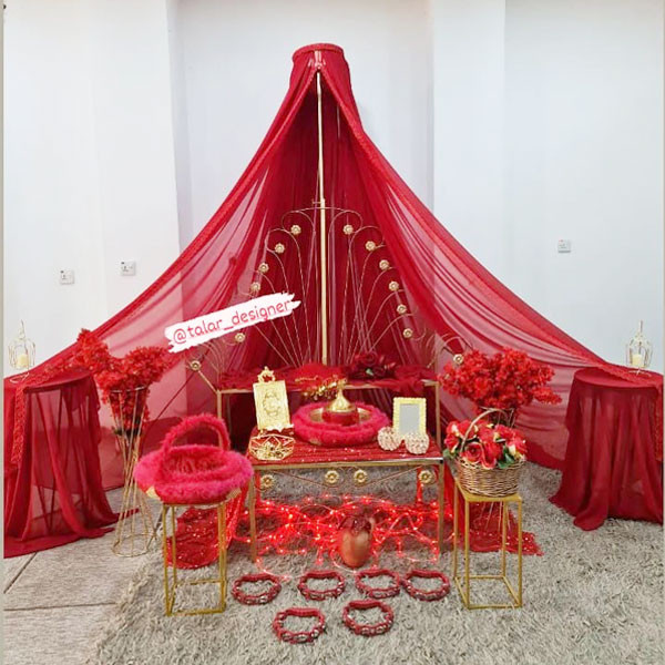 Wedding - Engage Decoration Triangle Tent Covered by Red Sheet with 1 Metallic Table, 1 Metallic Couch , 2 + 2 stands for Flowers & Candles, Golden Metallic Quran Book, etc..